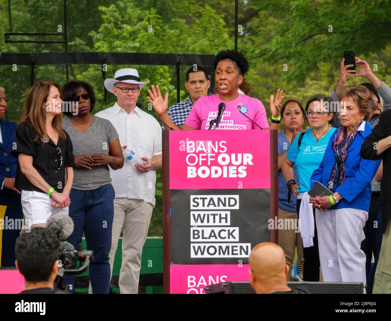 Chicago, Illinois, USA. 14th May 2022. Illinois Leiutenant Governor Juliana Stratton addresses the crowd at the Rally for Abortion Justice in Union Park today. Illinois Senate President Don Harmon in white hat and Congresswoman Jan Schakowski at far right. Stock Photo