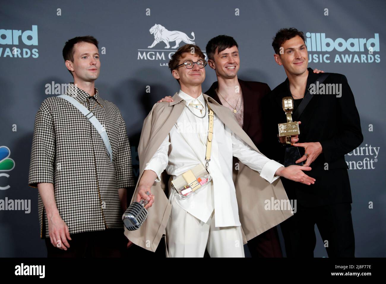 Members of Glass Animals pose with the award for Top Rock Artist in the photo room during the Billboard Music Awards in Las Vegas, Nevada U.S. May 15, 2022. REUTERS/Steve Marcus Stock Photo