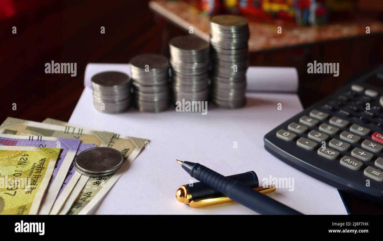 Economic growth,success pillars,Closeup photo of coin,salary growth,saving and investing ,financial boost,inflation,medical expenditure Stock Photo