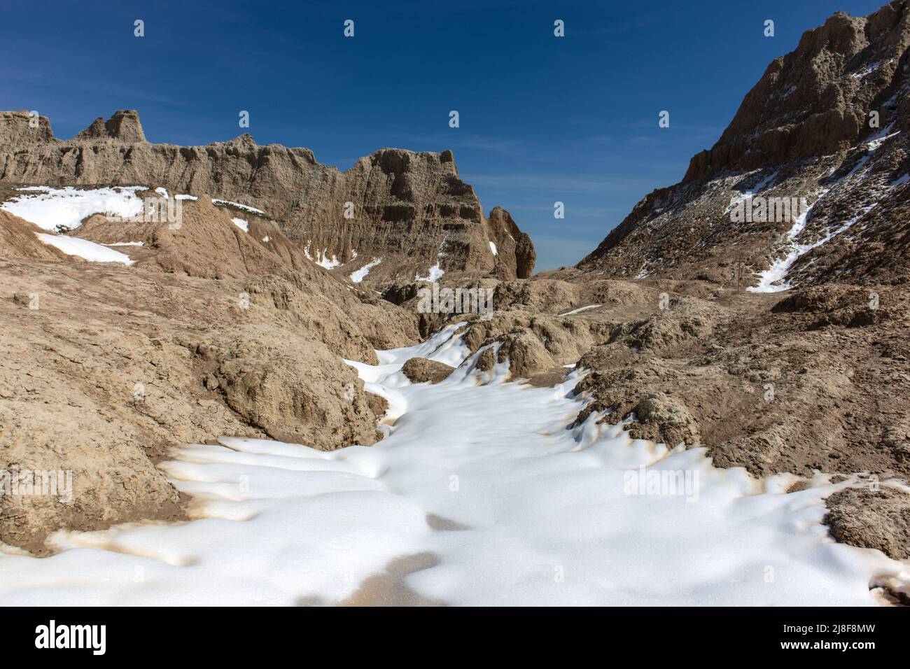 Snow covers the landscape at Badlands National Park in South Dakota in