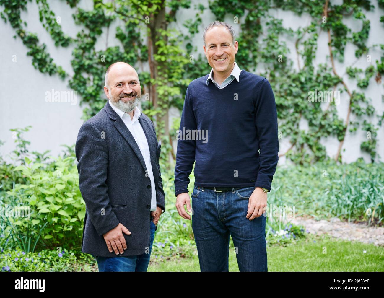 Berlin, Germany. 04th May, 2022. Marc Schmitz (l.), Managing Director of Ströer Content Group GmbH, and Florian Harms, Editor-in-Chief of t-online.de and Co-Managing Director of Ströer News Publishing GmbH, stand in the courtyard of the T-Online editorial office after an interview with Deutsche Presse-Agentur. The journalistic news portal 't-online' has been increasingly reaching younger audiences of millions since it was taken over by outdoor advertiser Ströer in 2015. Credit: Annette Riedl/dpa/Alamy Live News Stock Photo