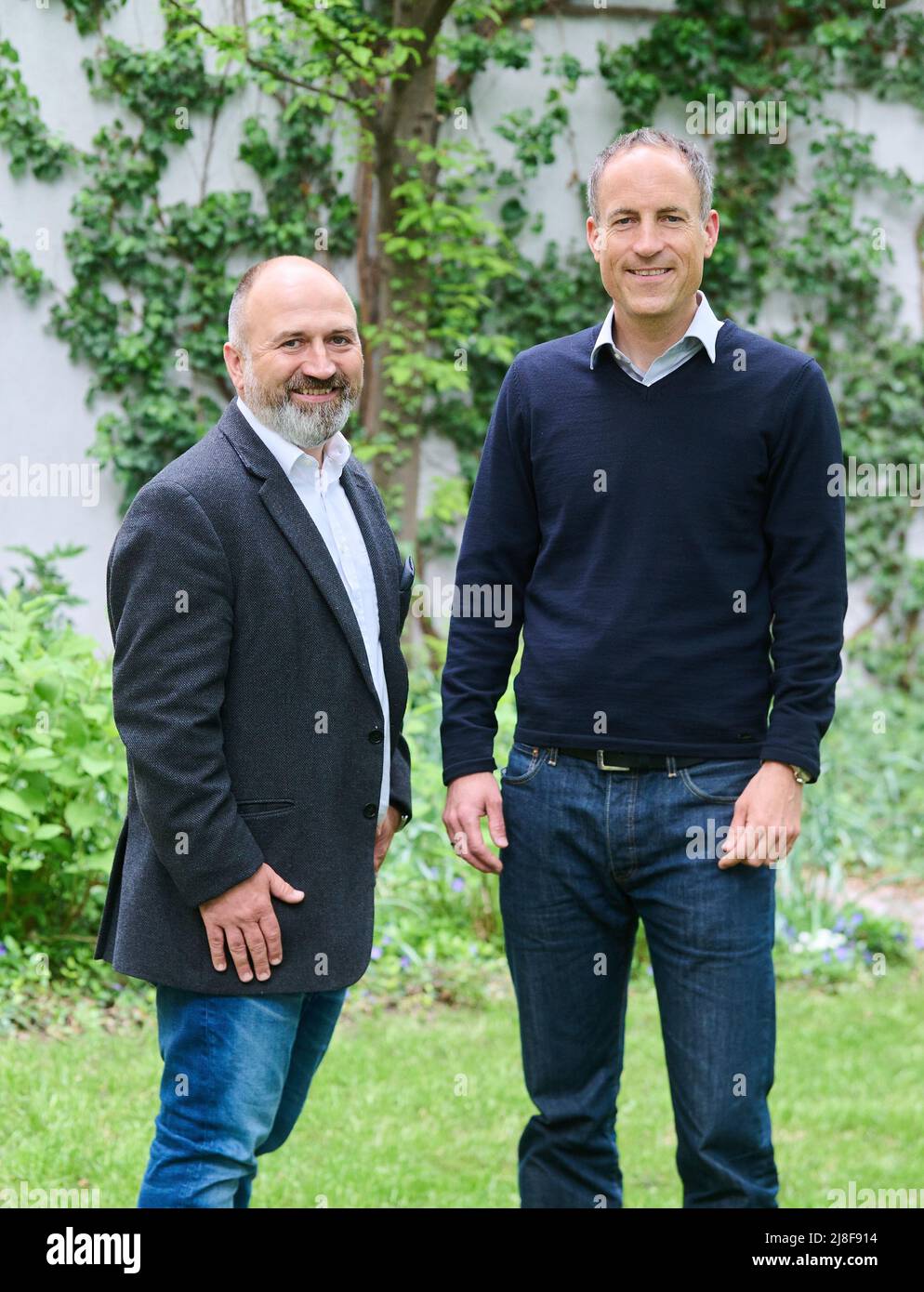 Berlin, Germany. 04th May, 2022. Marc Schmitz (l), Managing Director of Ströer Content Group GmbH, and Florian Harms, Editor-in-Chief of t-online.de and Co-Managing Director of Ströer News Publishing GmbH, stand in the courtyard of the T-Online editorial office after an interview with Deutsche Presse-Agentur. The journalistic news portal 't-online' has been increasingly reaching younger audiences of millions since it was taken over by outdoor advertiser Ströer in 2015. Credit: Annette Riedl/dpa/Alamy Live News Stock Photo