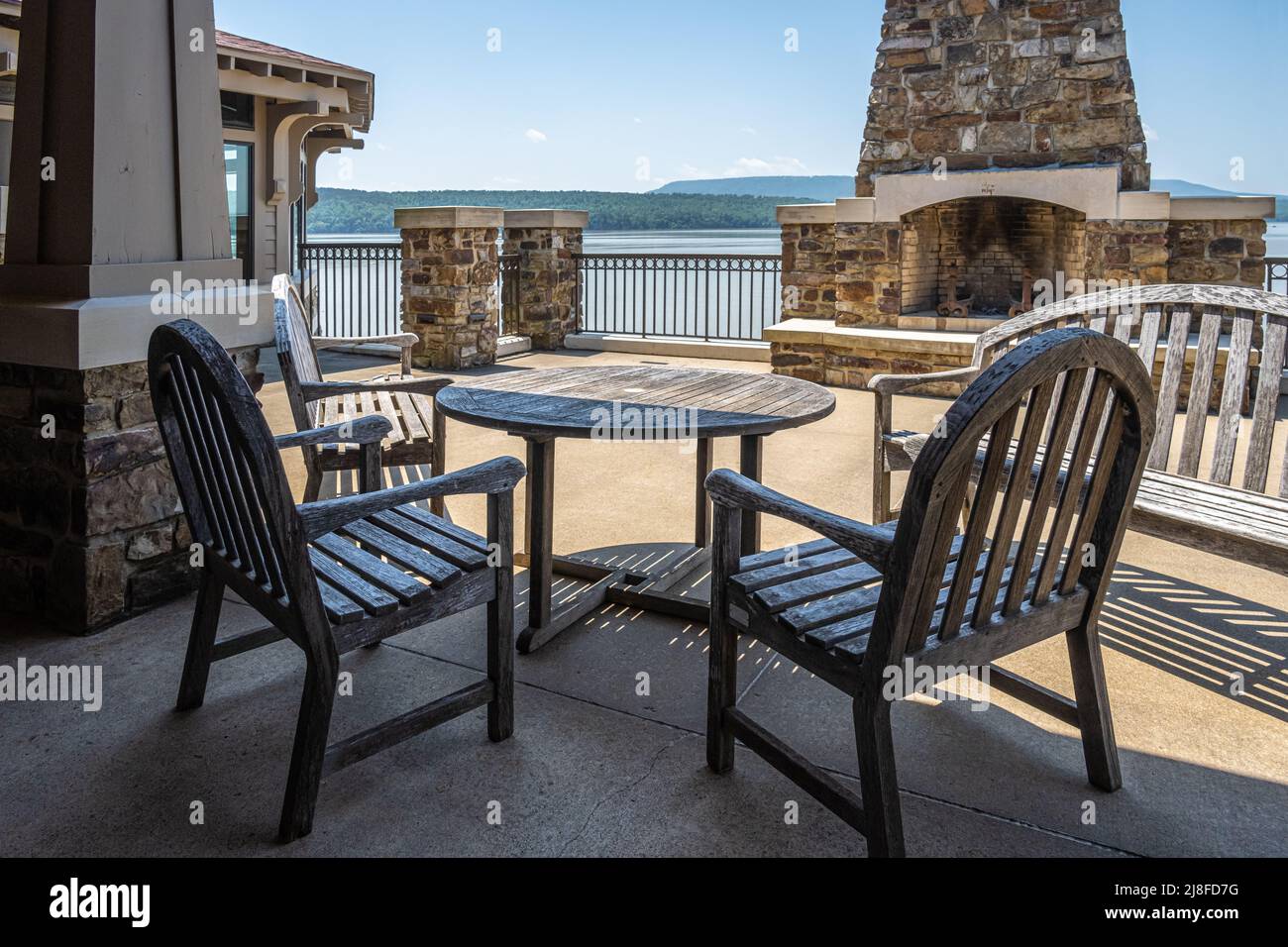 Outdoor patio with stone fireplace overlooking Lake Dardanelle from the Lake Dardanelle State Park Visitors Center in Russellville, Arkansas. (USA) Stock Photo