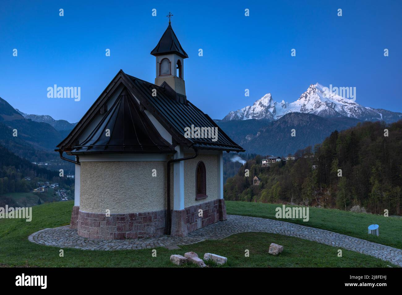 Dawn at Kirchleitn chapel in front of Watzmann mountain, Berchtesgaden, Germany Stock Photo