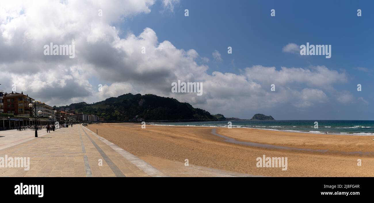 Zarautz, Spain - 5 May, 2022: beachfront boardwalk and golden sand beach in Zarautz in the Spanish Basque Country Stock Photo