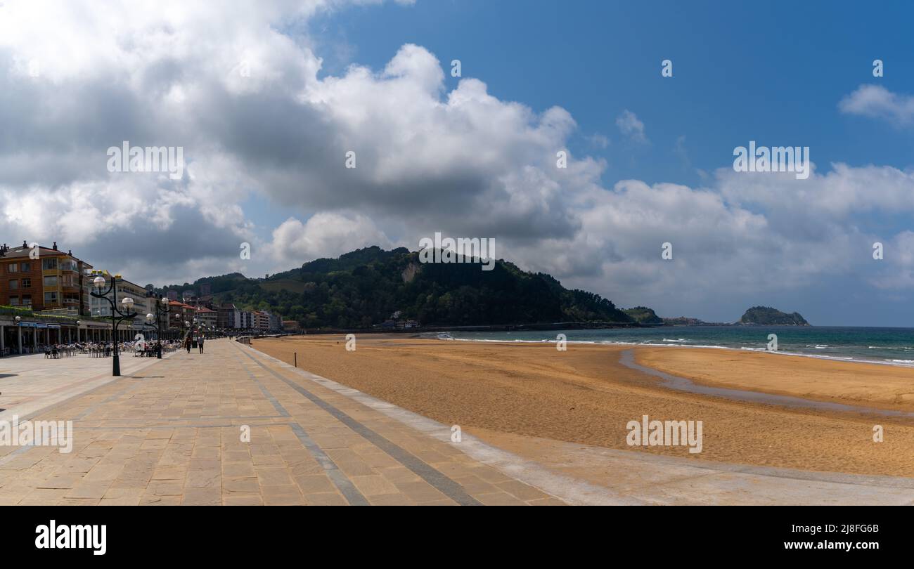 Zarautz, Spain - 5 May, 2022: beachfront boardwalk and golden sand beach in Zarautz in the Spanish Basque Country Stock Photo