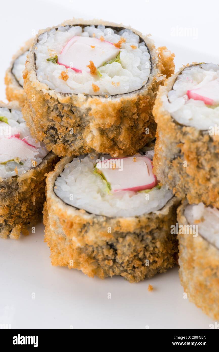 Sushi set and composition at white background. Japanese food restaurant