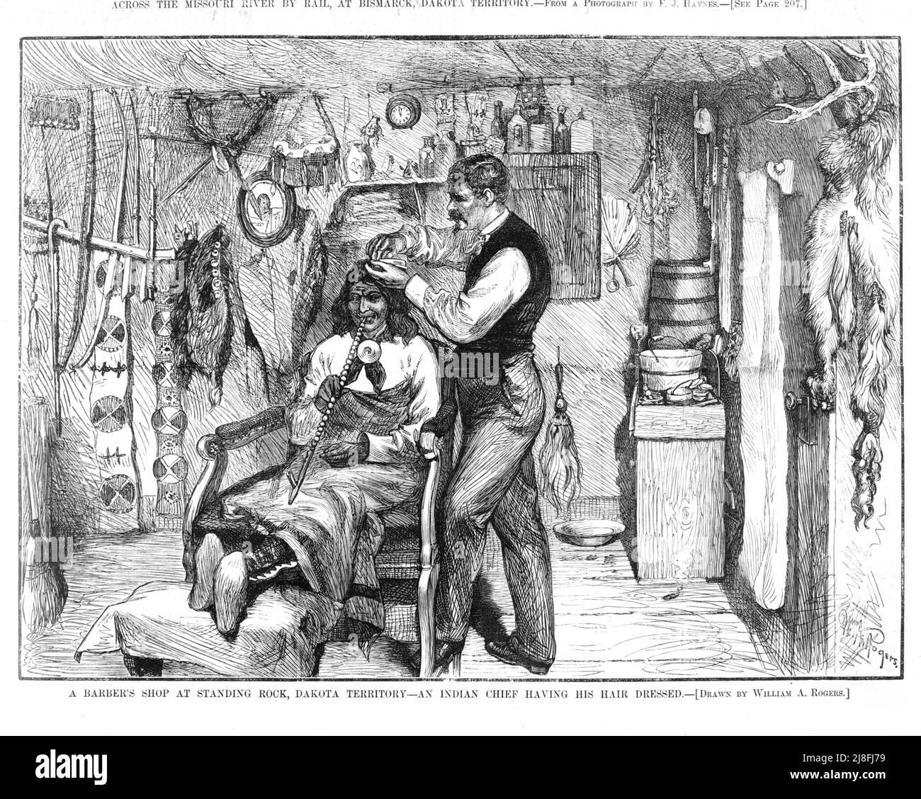 William A Rogers - A barbers shop at Standing Rock, Dakota territory - An Indian chief having his hair dressed Stock Photo
