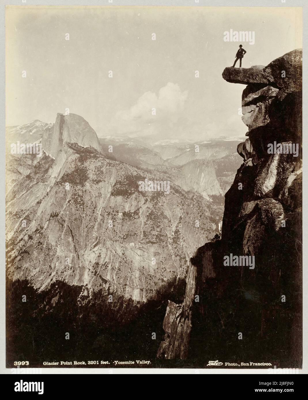 Isaiah West Taber-Man on Glacier Point Rock in Yosemite Valley -  Glacier Point Rock, 3201 feet Stock Photo