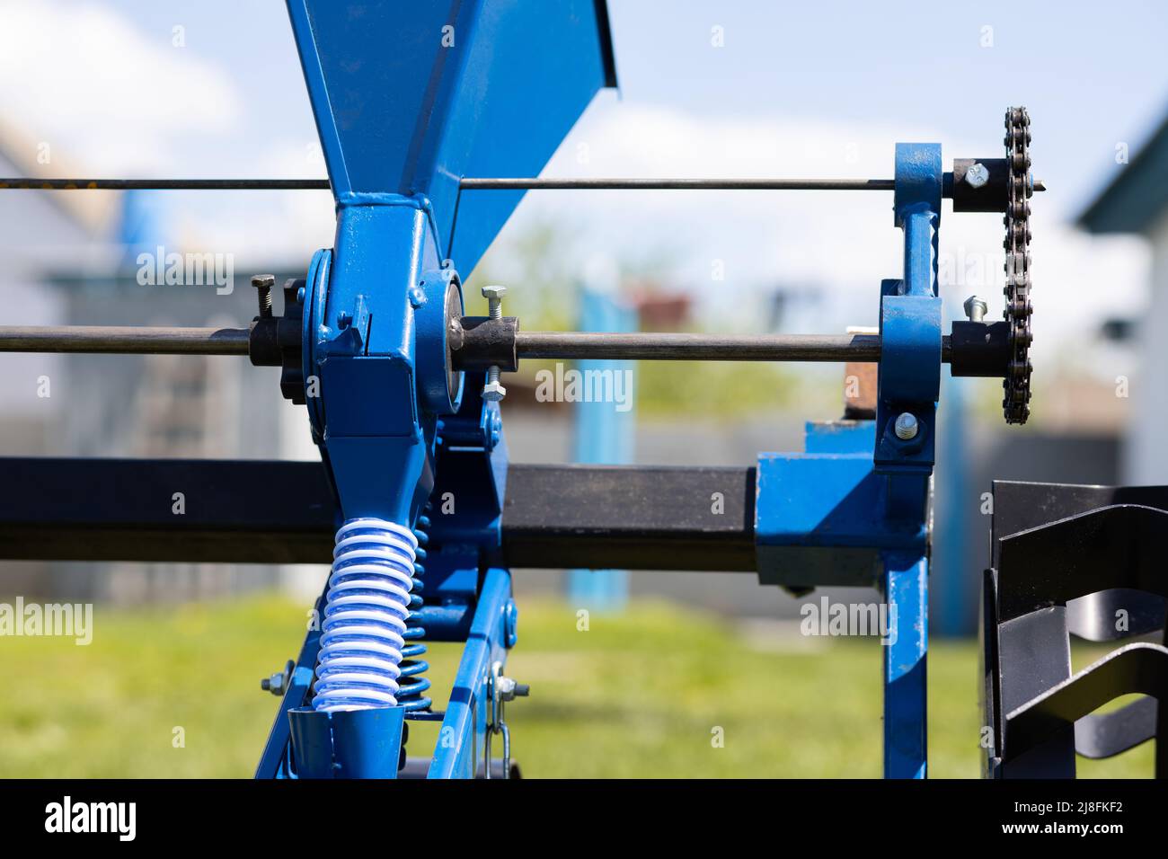 Close up details of seeder for agriculture on sky background. High quality photo Stock Photo