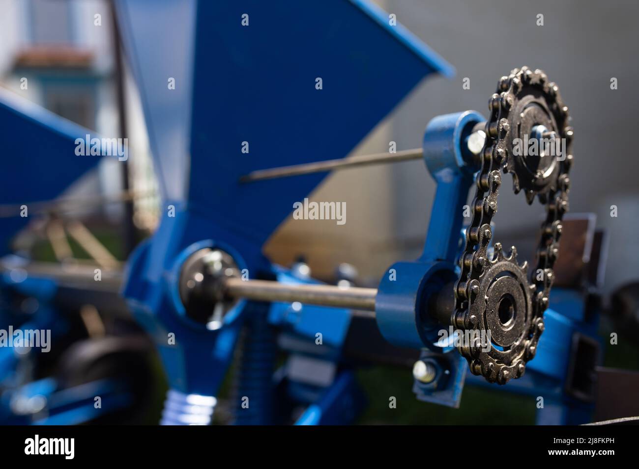 Close up of a chain on a seeder for agriculture. High quality photo Stock Photo