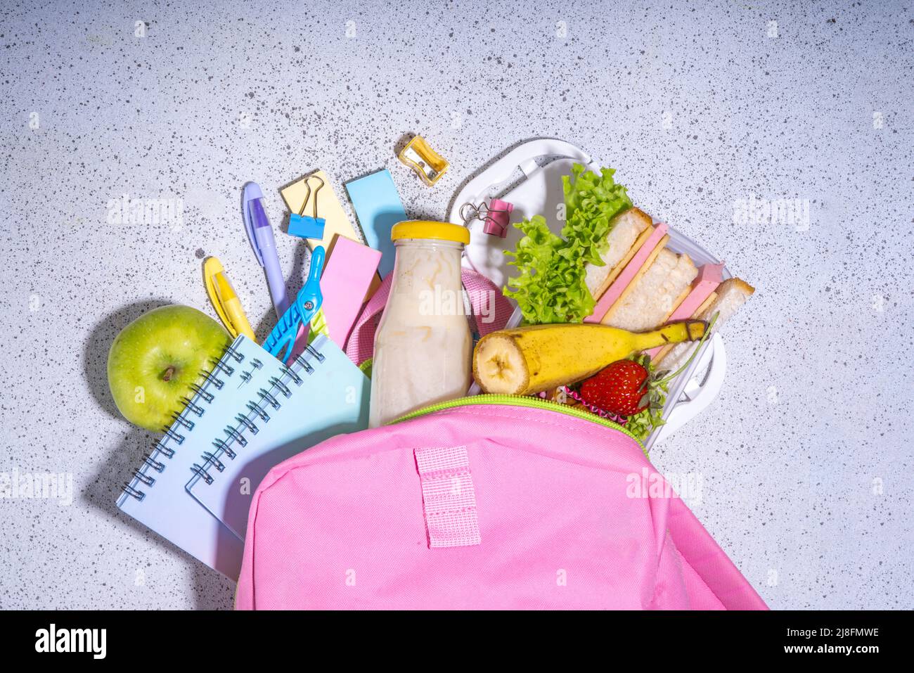 Healthy school lunch box sandwich, vegetables, fruit, nuts and yogurt