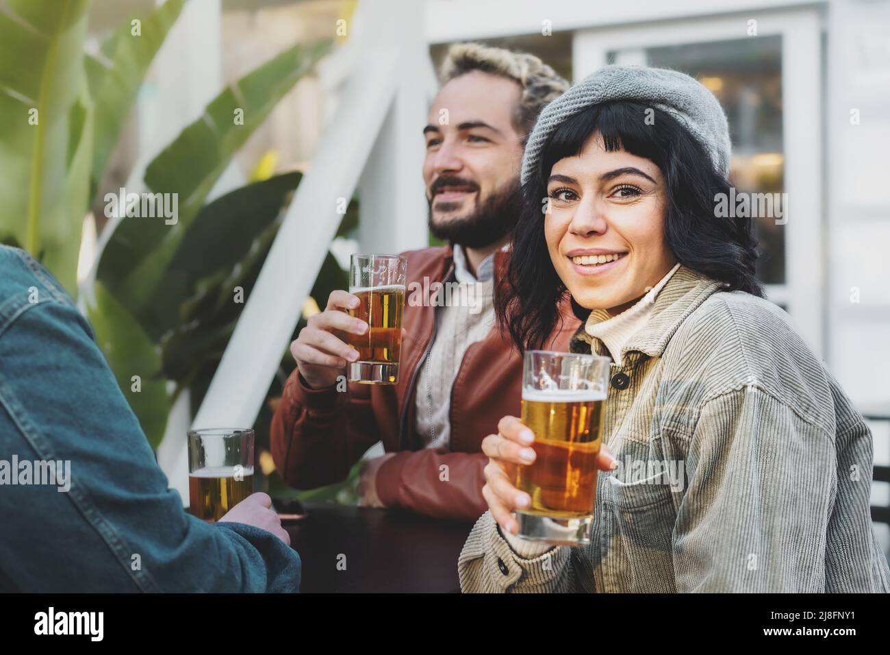 Cheerful people spending carefree time in the afternoon taking and