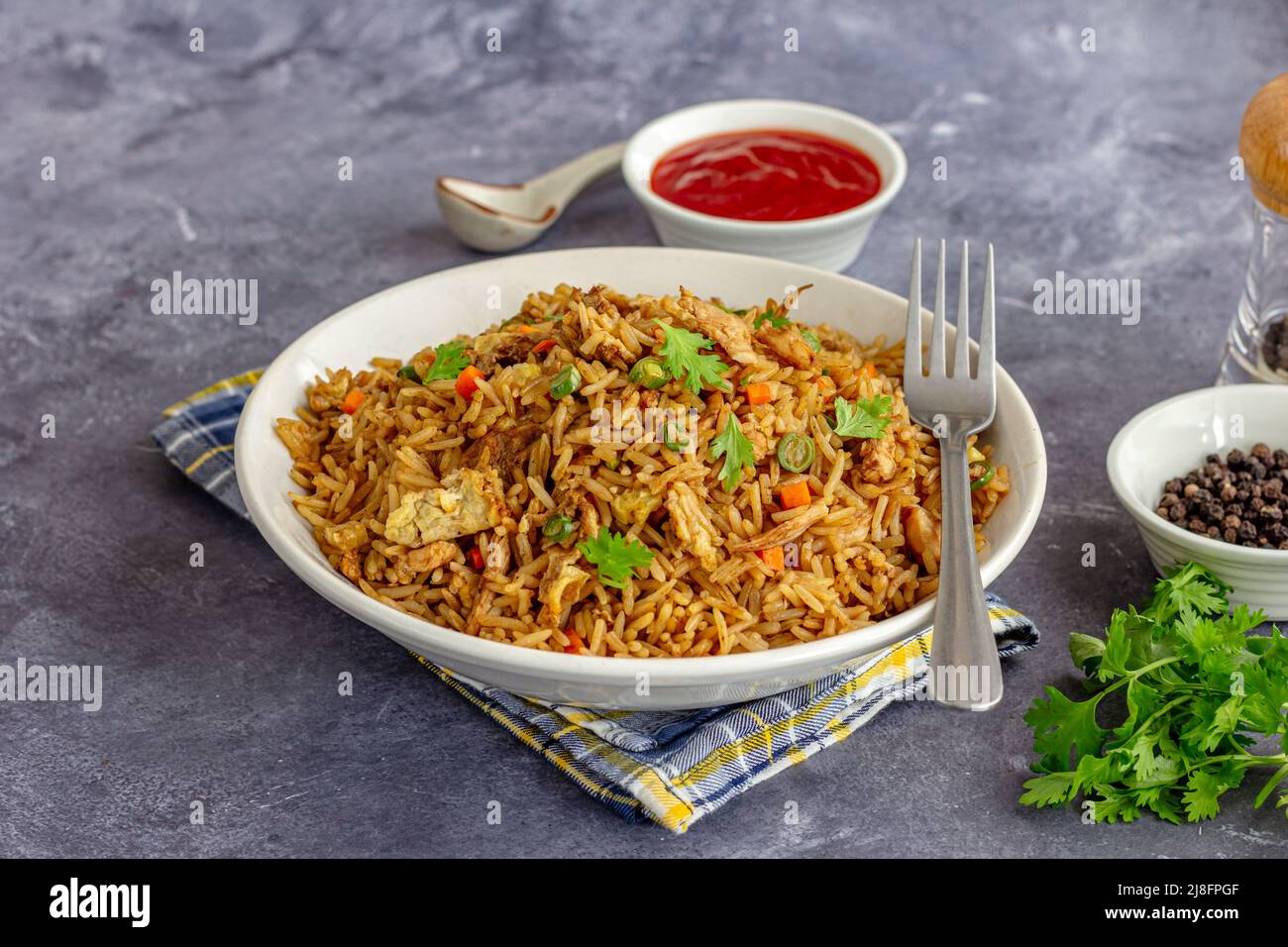 Chinese Chicken Fried Rice with Condiments Low Angle Close Up Photo ...