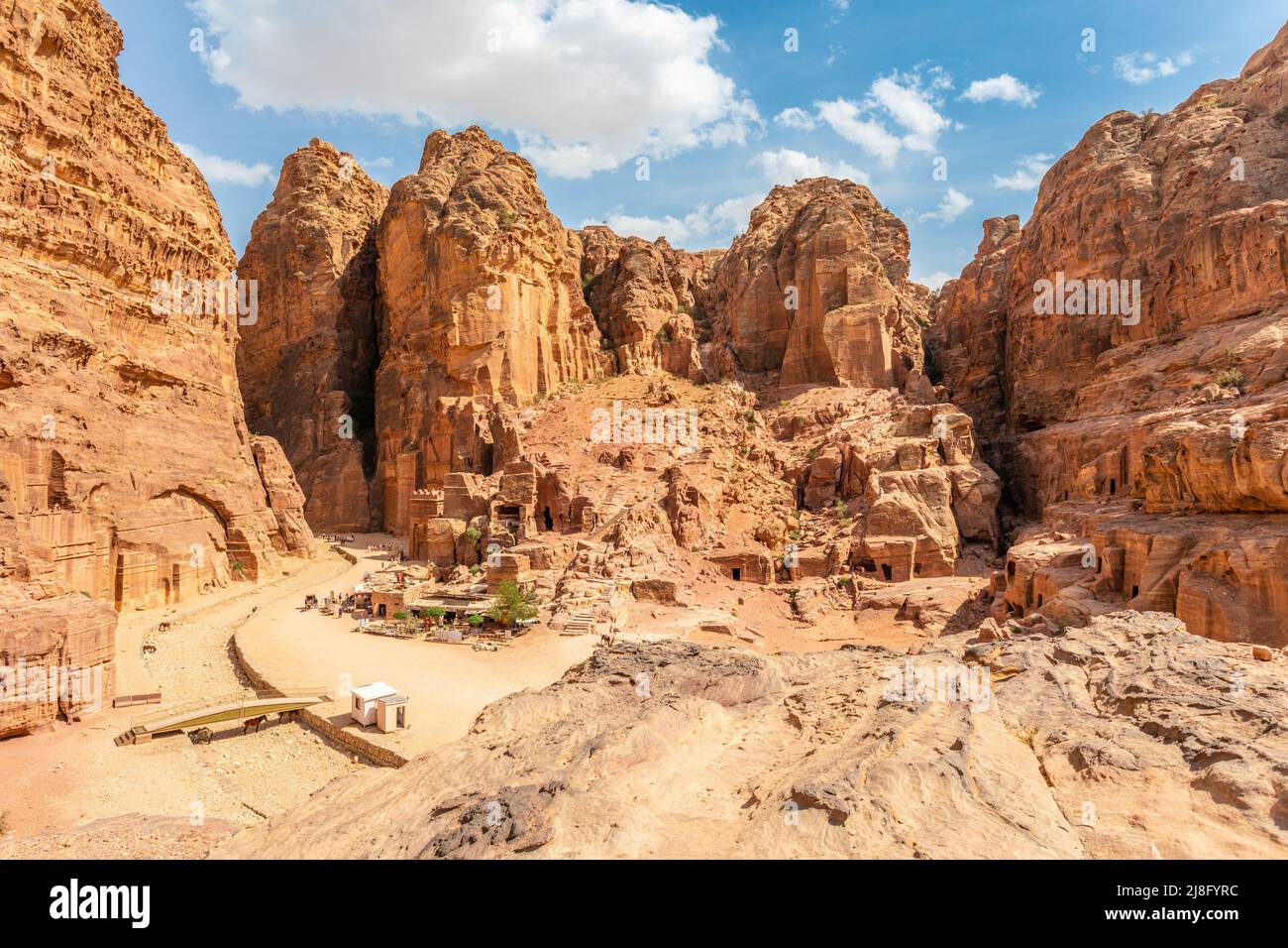 View to the facades street of Petra with ancient Nabataean tombs, Jordan Stock Photo