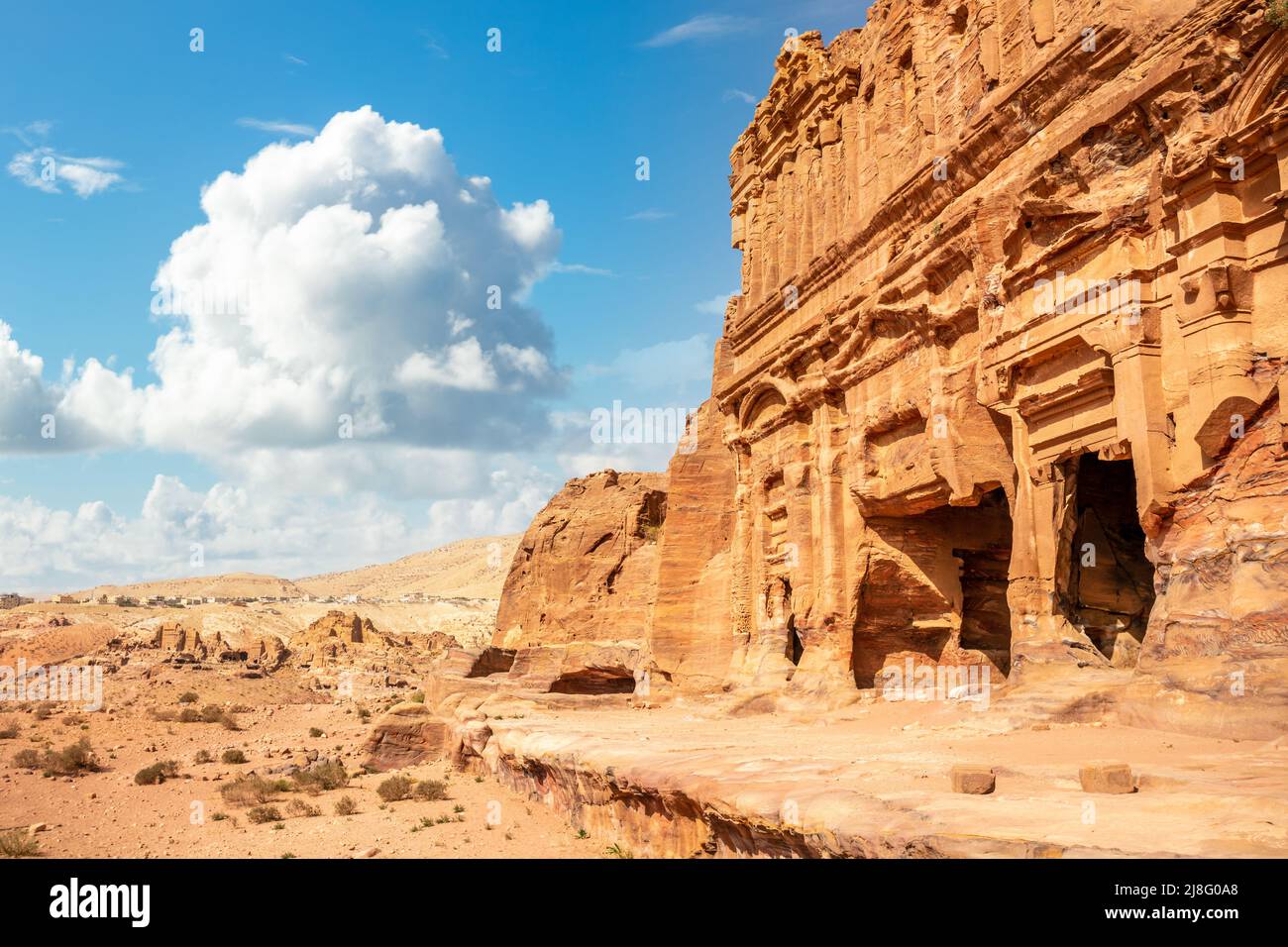 Ancient Nabataean Palace tomb carved in sandstone rock, Petra, Jordan Stock Photo