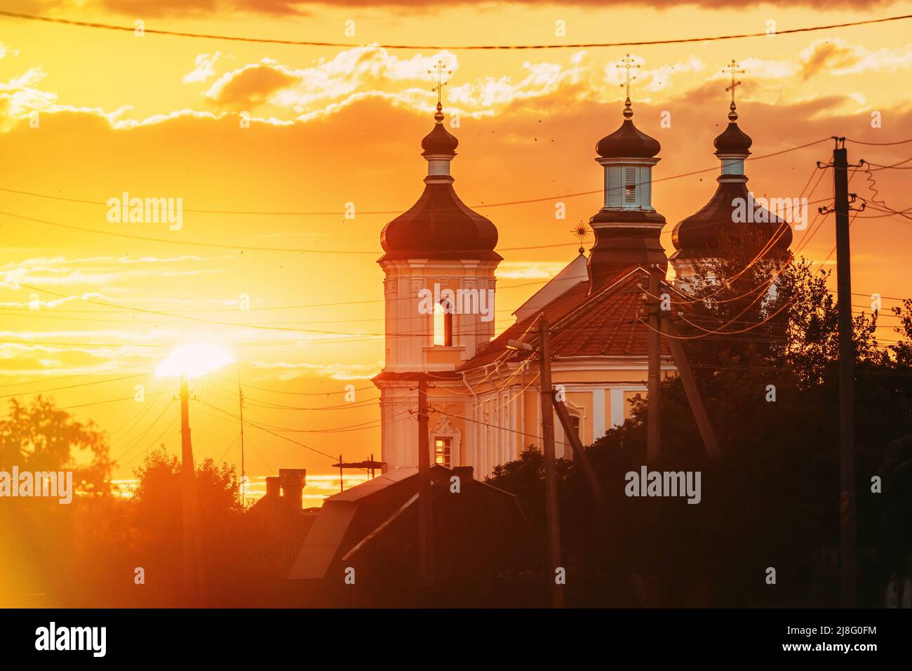 Yurovichi, Belarus. , Big Sun Above Jesuit Collegium Complex Stock Photo