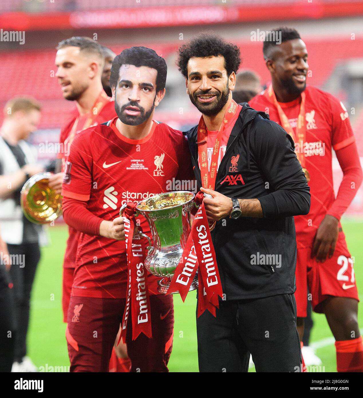 14 May 2022 - Chelsea v Liverpool - Emirates FA Cup Final - Wembley Stadium  Mohamed Salah and Harvey Elliott ( in a Mo Salah mask ) celebrate with the FA Cup  Picture Credit : © Mark Pain / Alamy Live News Stock Photo