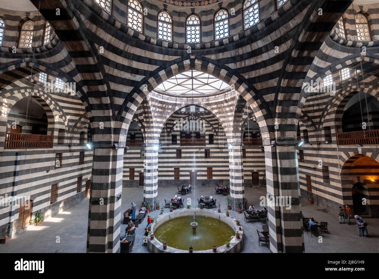 Damascus, Syria -May, 2022: Historic architecture (Khan As'ad Pasha),the largest caravanserai in the Old City of Damascus Stock Photo