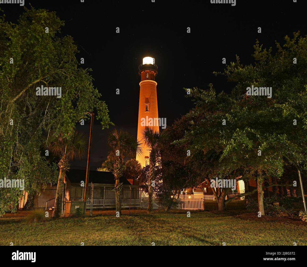 The historic Lighthouse in Ponce Inlet, Florida is illuminated on ...