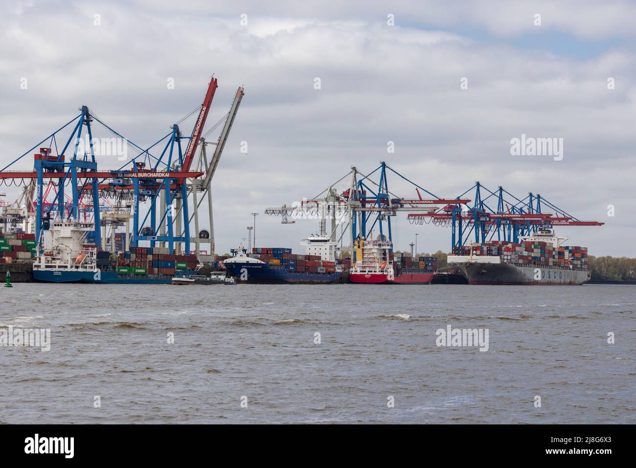 Hamburg, Germany - 5-3-2022: Ships loading and unloading at the Burchardkai terminal quay in Hamburg Stock Photo
