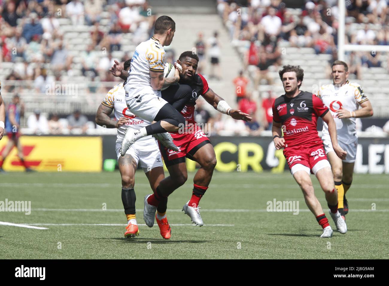 Jacob UMAGA of Wasps and Josua TUISOVA of Lyon and Pierre-Louis BARASSI of Lyon during the EPCR Challenge Cup, Semi Finals rugby union match between LOU Rugby (Lyon) and Wasps on May 14, 2022 at Matmut Stadium Gerland in Lyon, France - Photo: Romain Biard/DPPI/LiveMedia Stock Photo