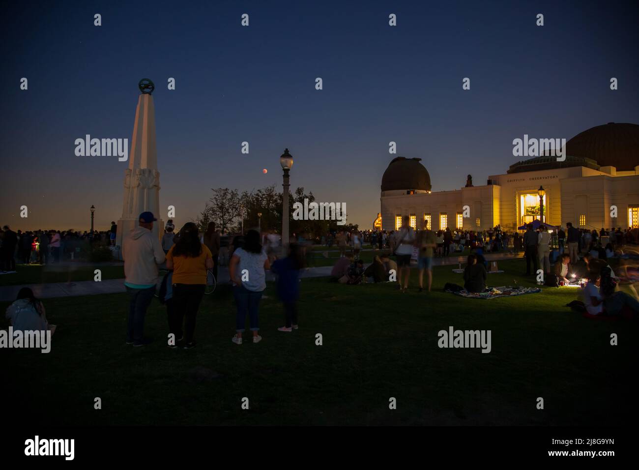 A crowd gathered at the Griffith Park Observatory in Los Angeles, California to watch the total lunar eclipse on Sunday May 15, 2022 Stock Photo