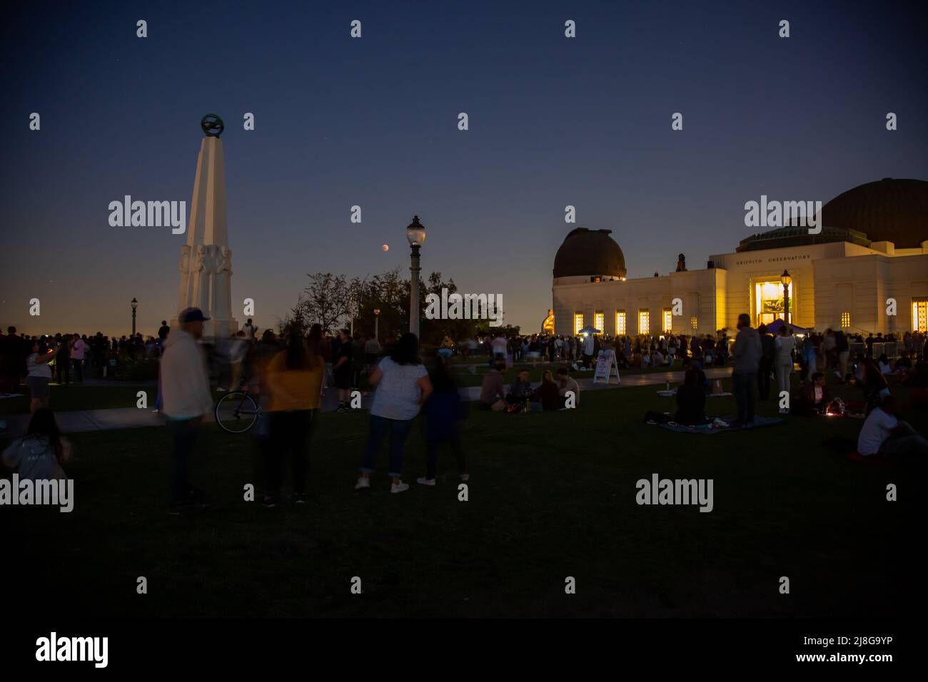 A crowd gathered at the Griffith Park Observatory in Los Angeles, California to watch the total lunar eclipse on Sunday May 15, 2022 Stock Photo