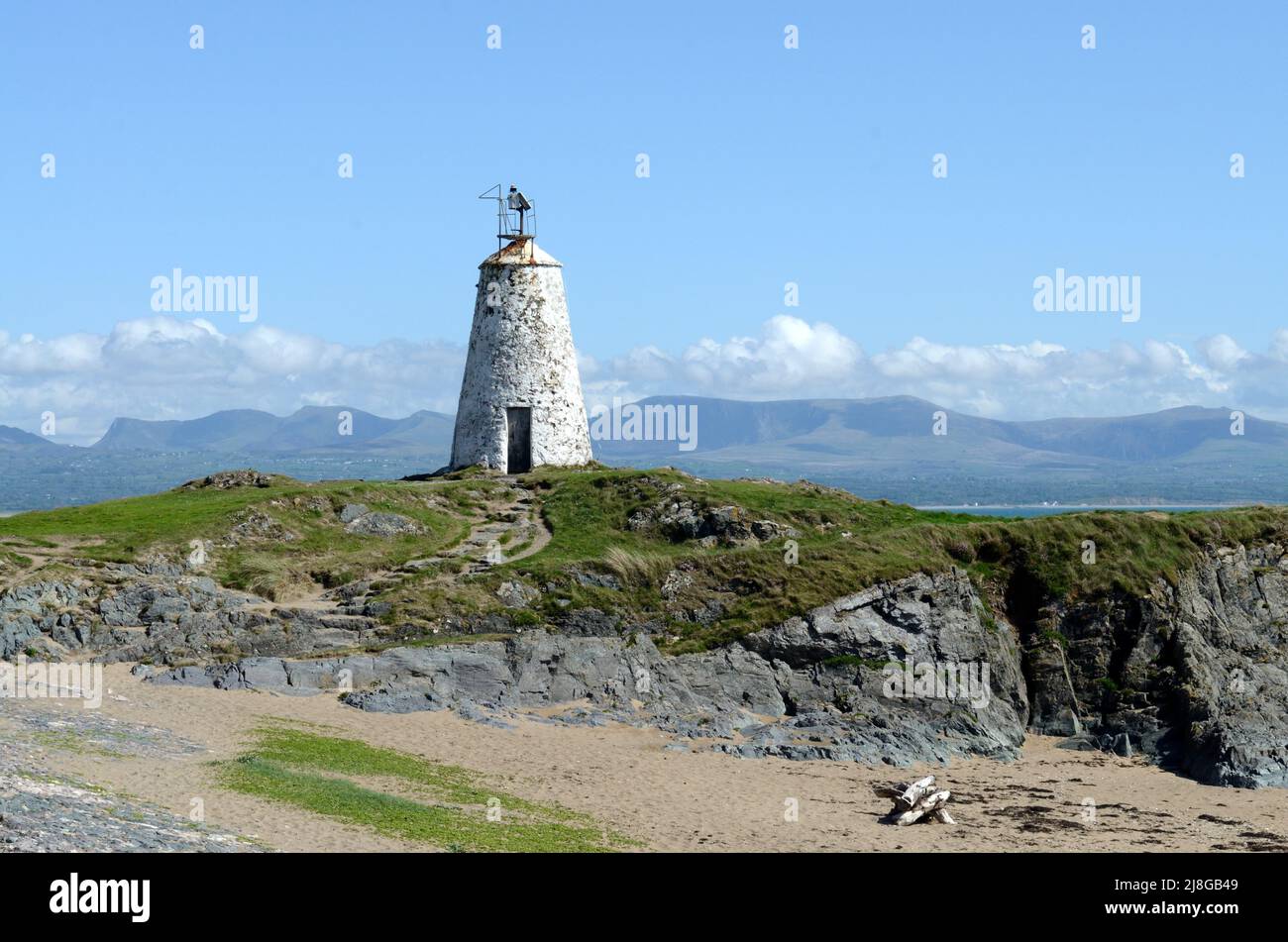 Old Twr Bach Lighthouse on Ynys Llanddwyn Island anglesey Wales Cymru UK Stock Photo