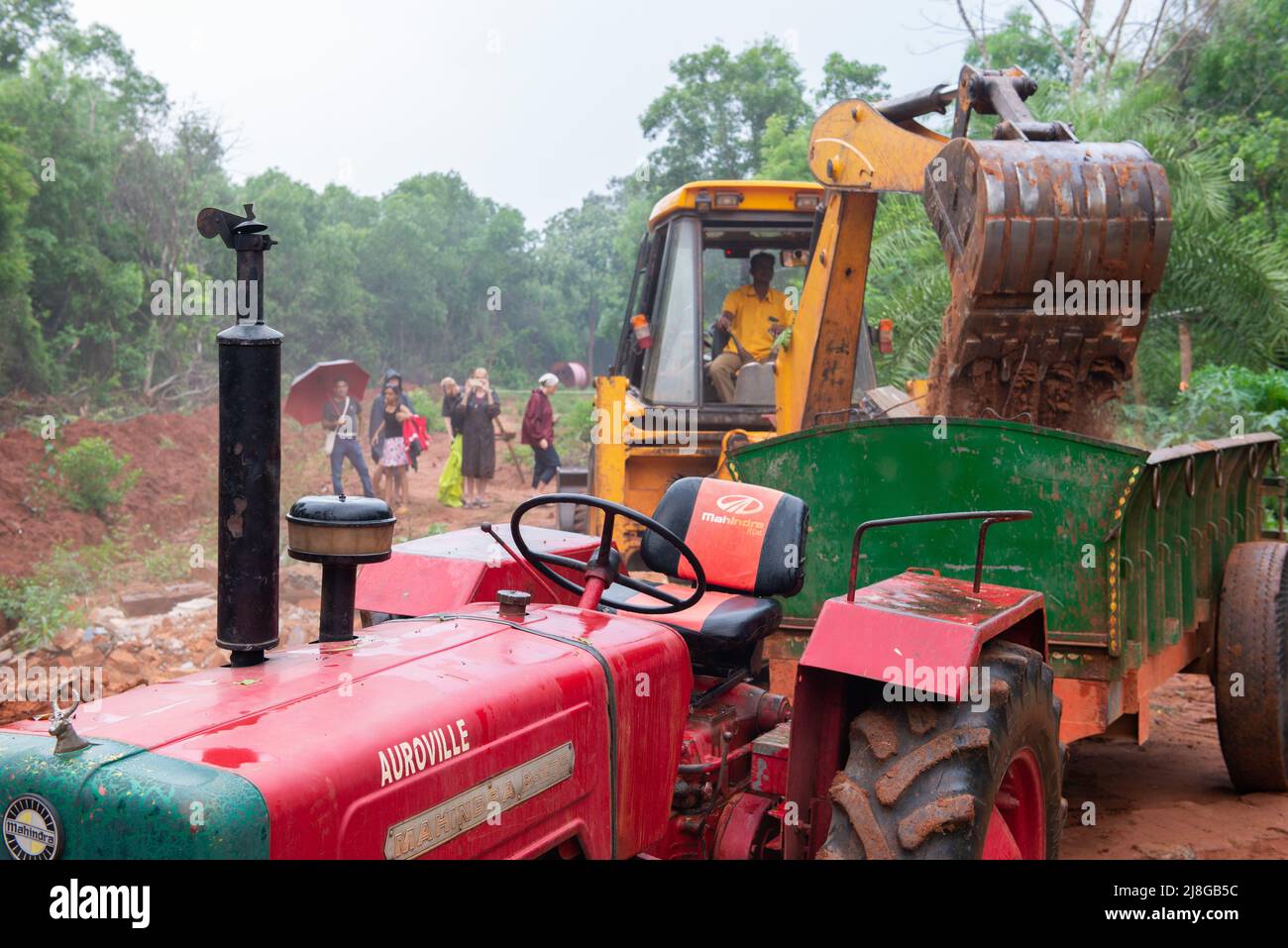 Auroville, India - 10th May 2022: Cleaning the area that was opened across the bliss forest to build a stretch of the Crown Road. Stock Photo