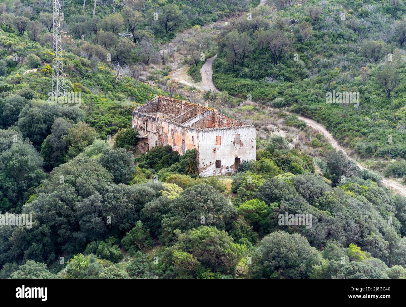 Ruined house in abandoned mining town of Naracauli (Laveria Brassey), Sardinia, Italy Stock Photo