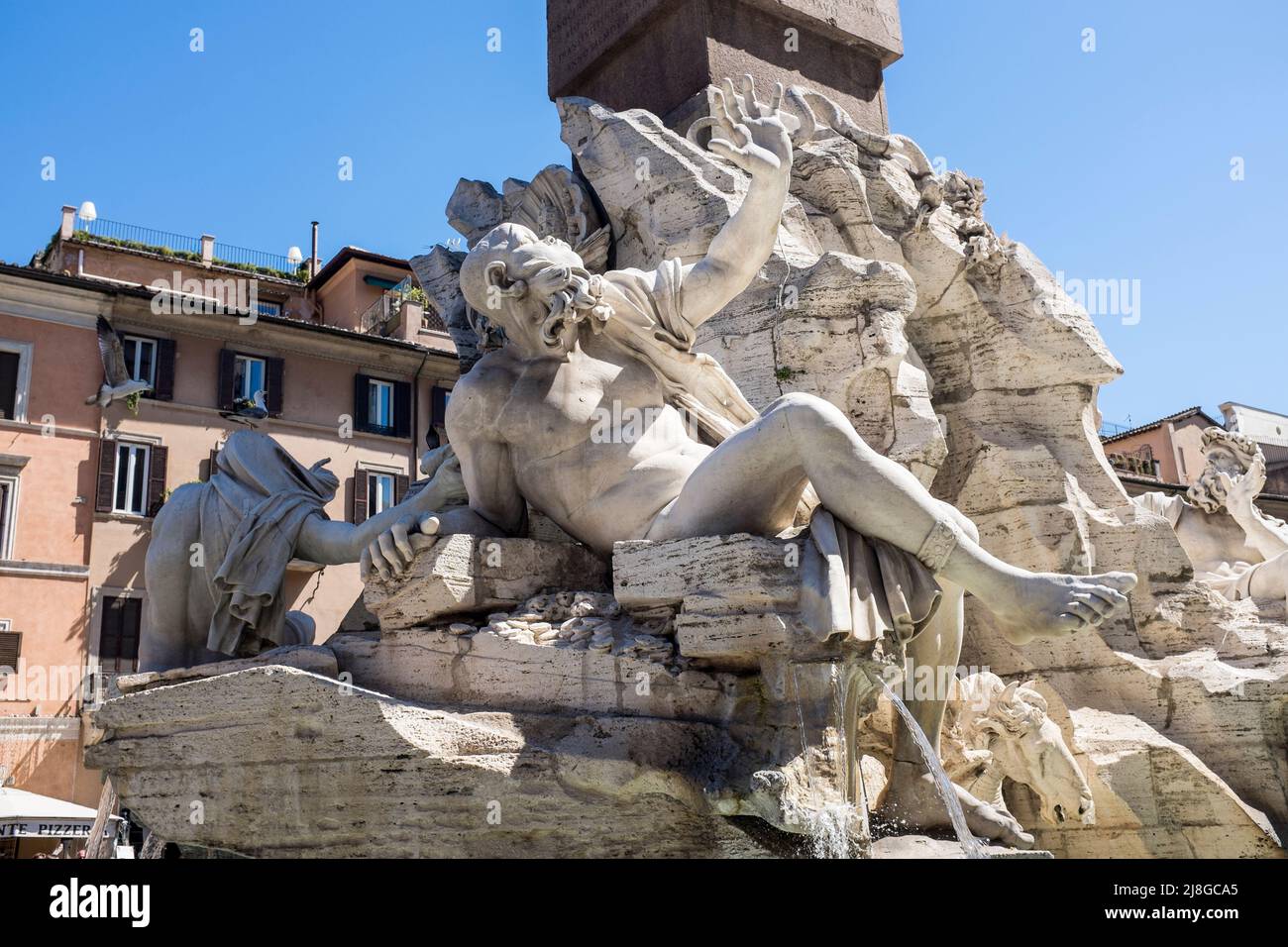 Four Rivers Fountain or Fontana dei Quattro Fiumi at Piazza Navona in Rome Italy Stock Photo