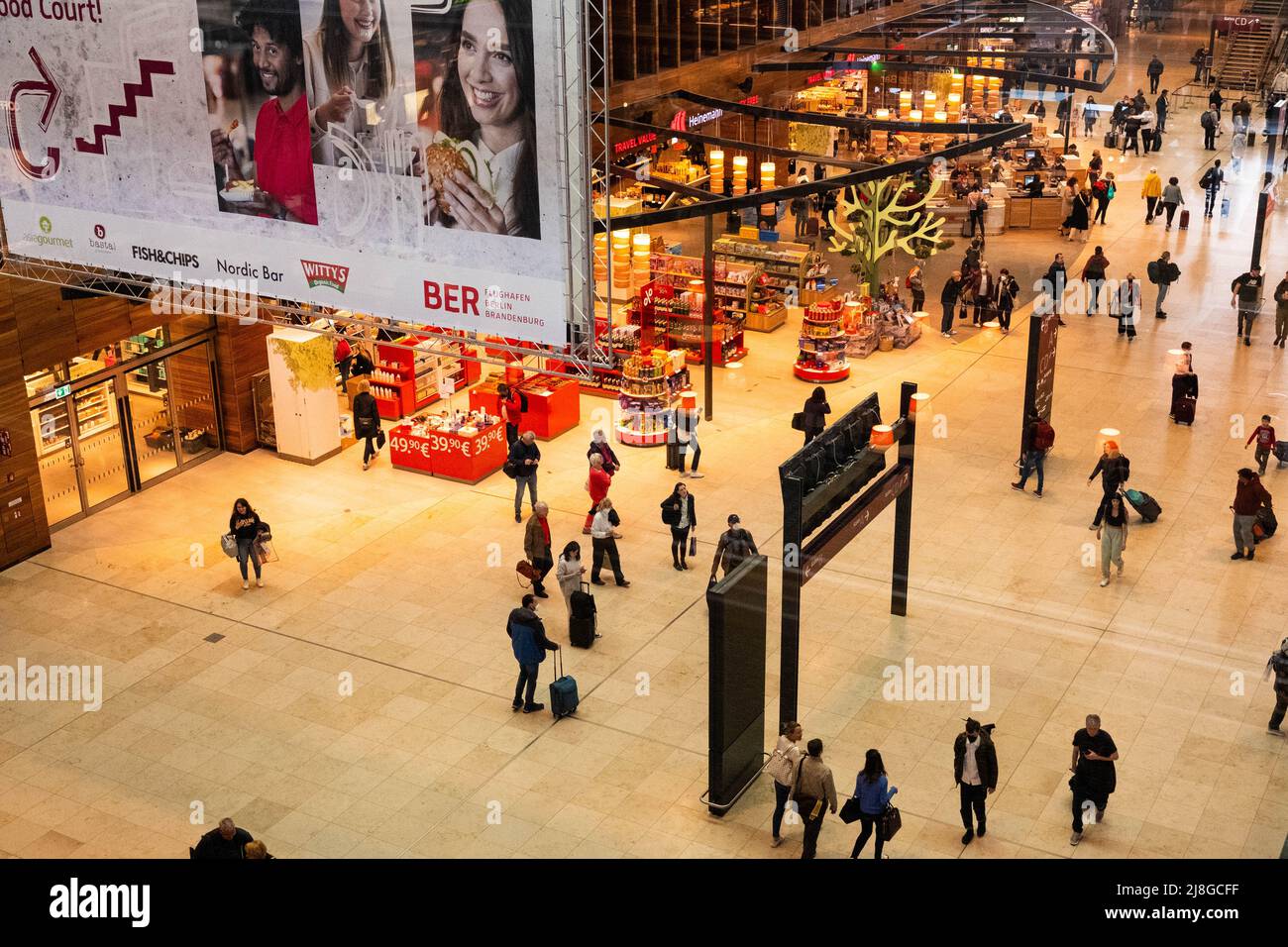 Berlin, Germany - May, 2022: Food area, inside of the Berlin Brandenburg Airport (BER, Willy Brandt) Stock Photo