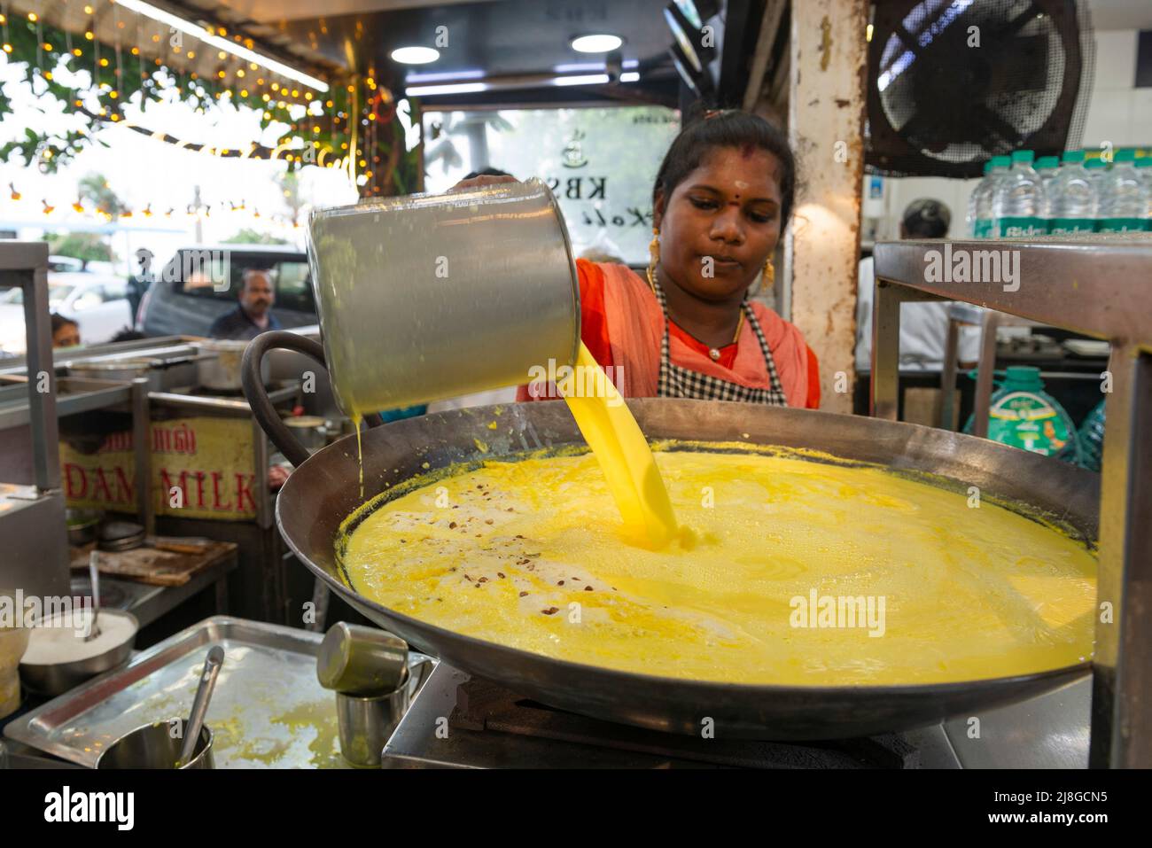 Pondicherry, India - 6th May 2022: Preparing a Badam Milk at KBS Kofi Bar in Law de Lauriston Street. Popular Indian drink made with milk and almonds Stock Photo