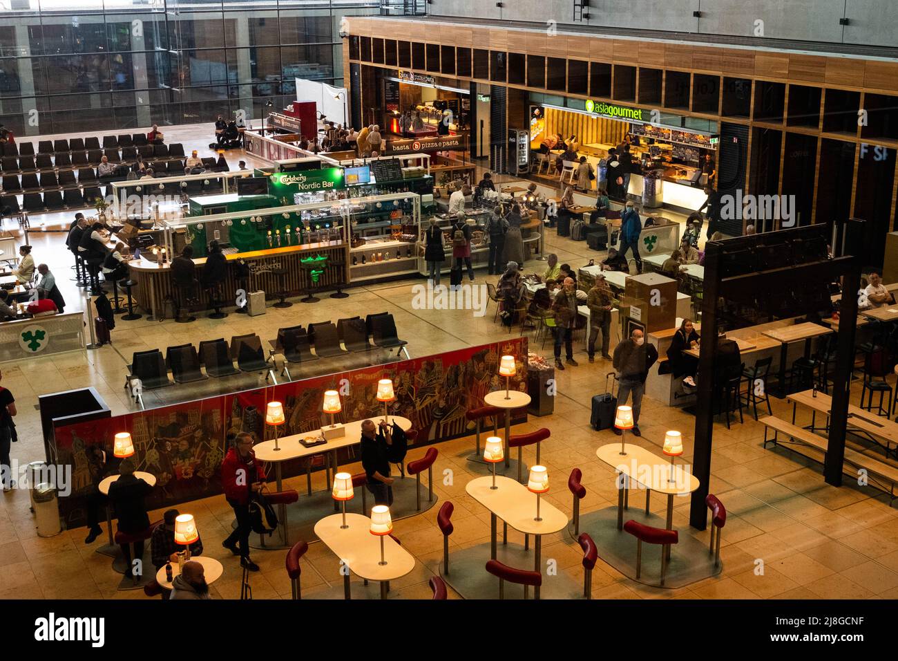 Berlin, Germany - May, 2022: Food area, inside of the Berlin Brandenburg Airport (BER, Willy Brandt) Stock Photo