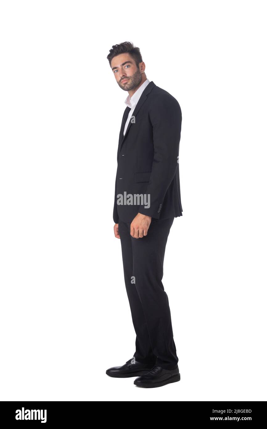 Full body of young handsome business man in black suit isolated on ...