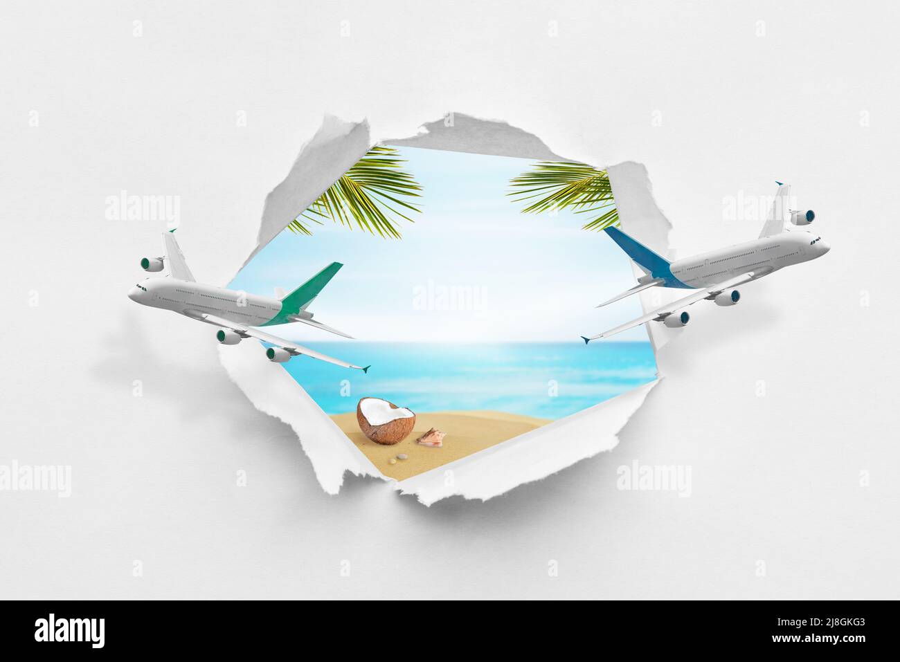 Planes break through paper and make a hole through which a tropical dream beach. Summer travel concept Stock Photo