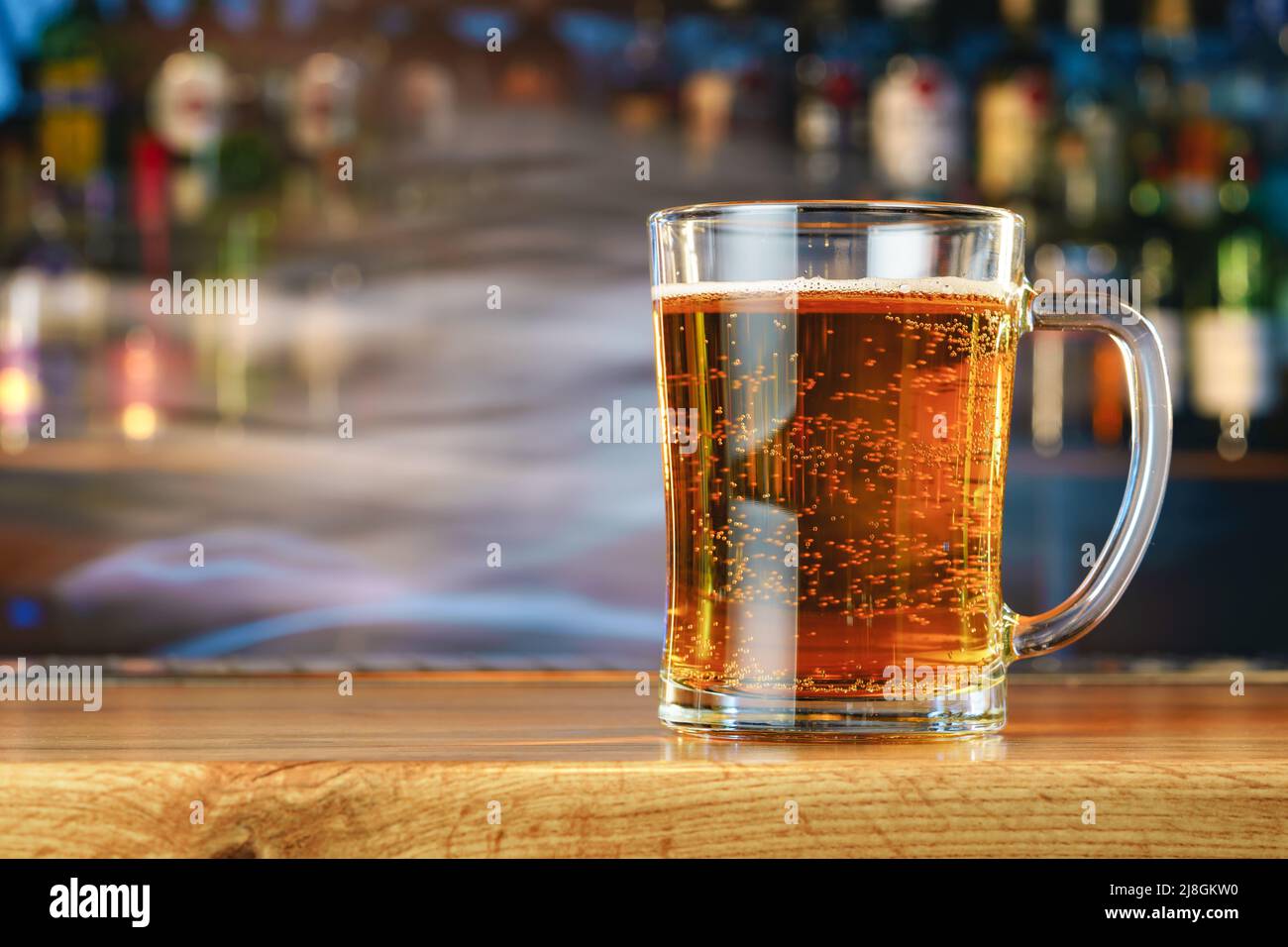 Fresh cold beer in glass on bar background Stock Photo Alamy