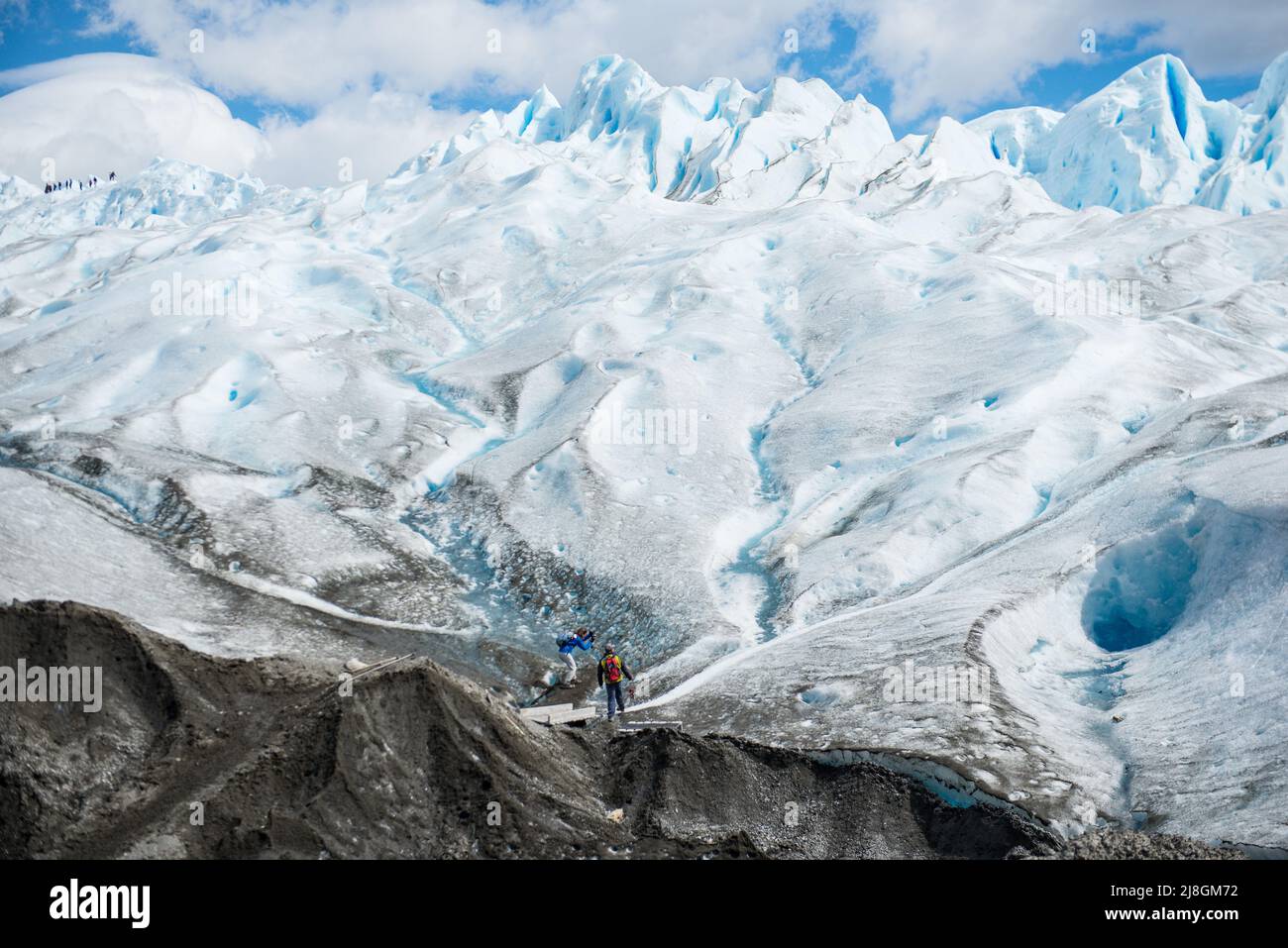 Hiking on a Glacier. Stock Photo