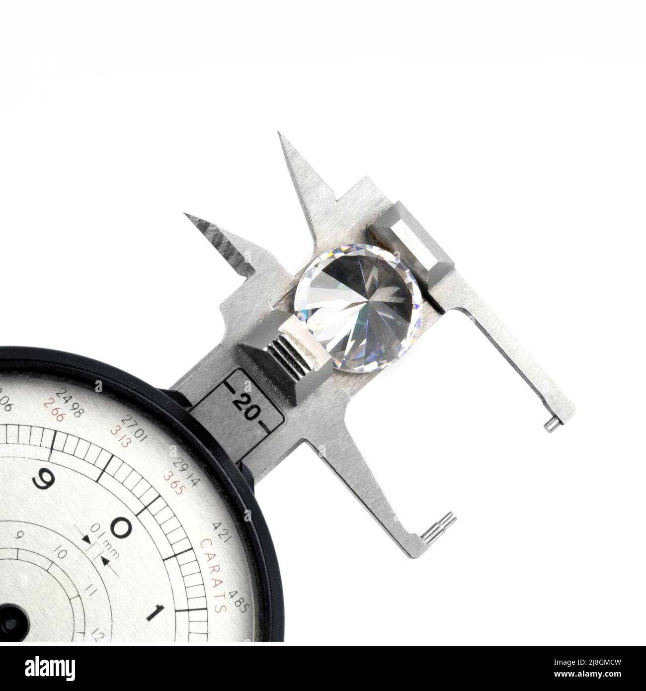 Diamond Size Measuring Gauge with Big Diamond on White Background Stock