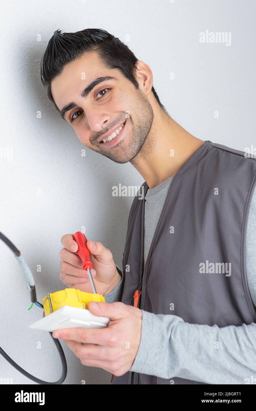 installing a programmable room thermostat Stock Photo Alamy