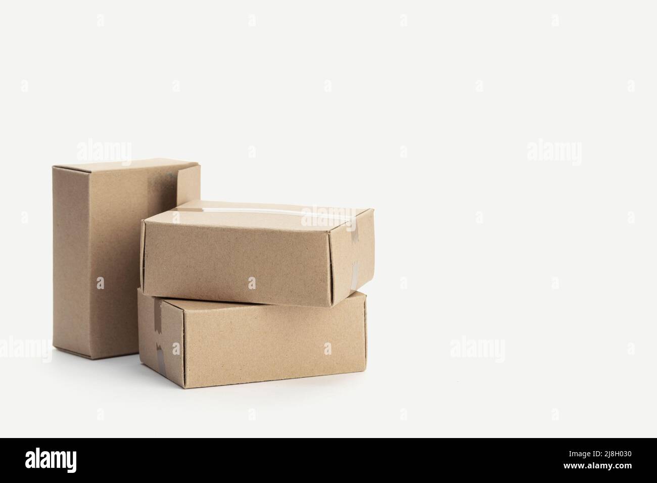 Pile of blank Cardboard boxes isolated on white background. Template Mock up. Copy space Stock Photo