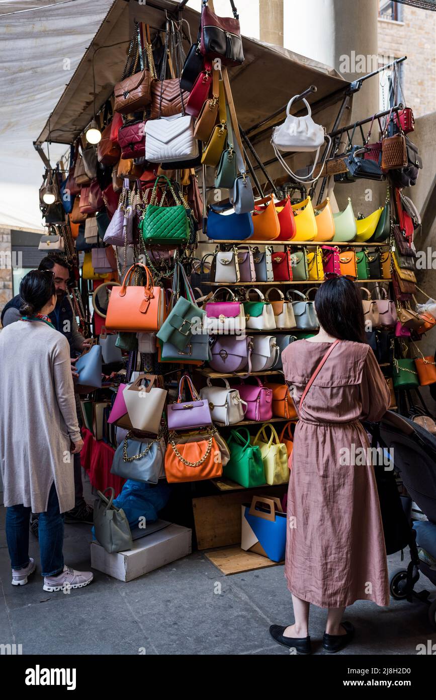 Florence, Tuscany, Italy - April 15, 2022: Leather goods at the Porcellino Market, Piazza del Mercato Nuovo Stock Photo