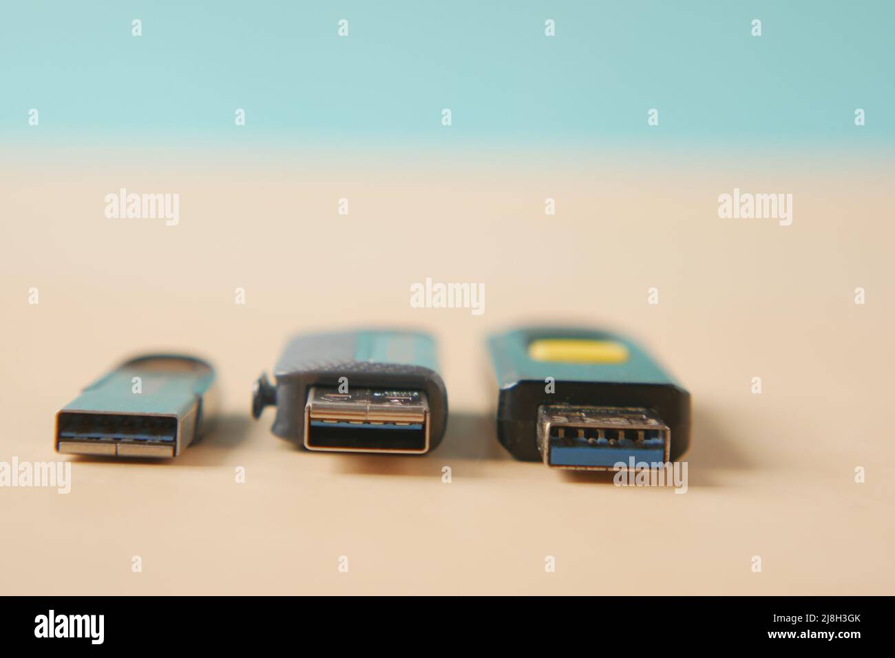 USB flash drive on blue background close up  Stock Photo