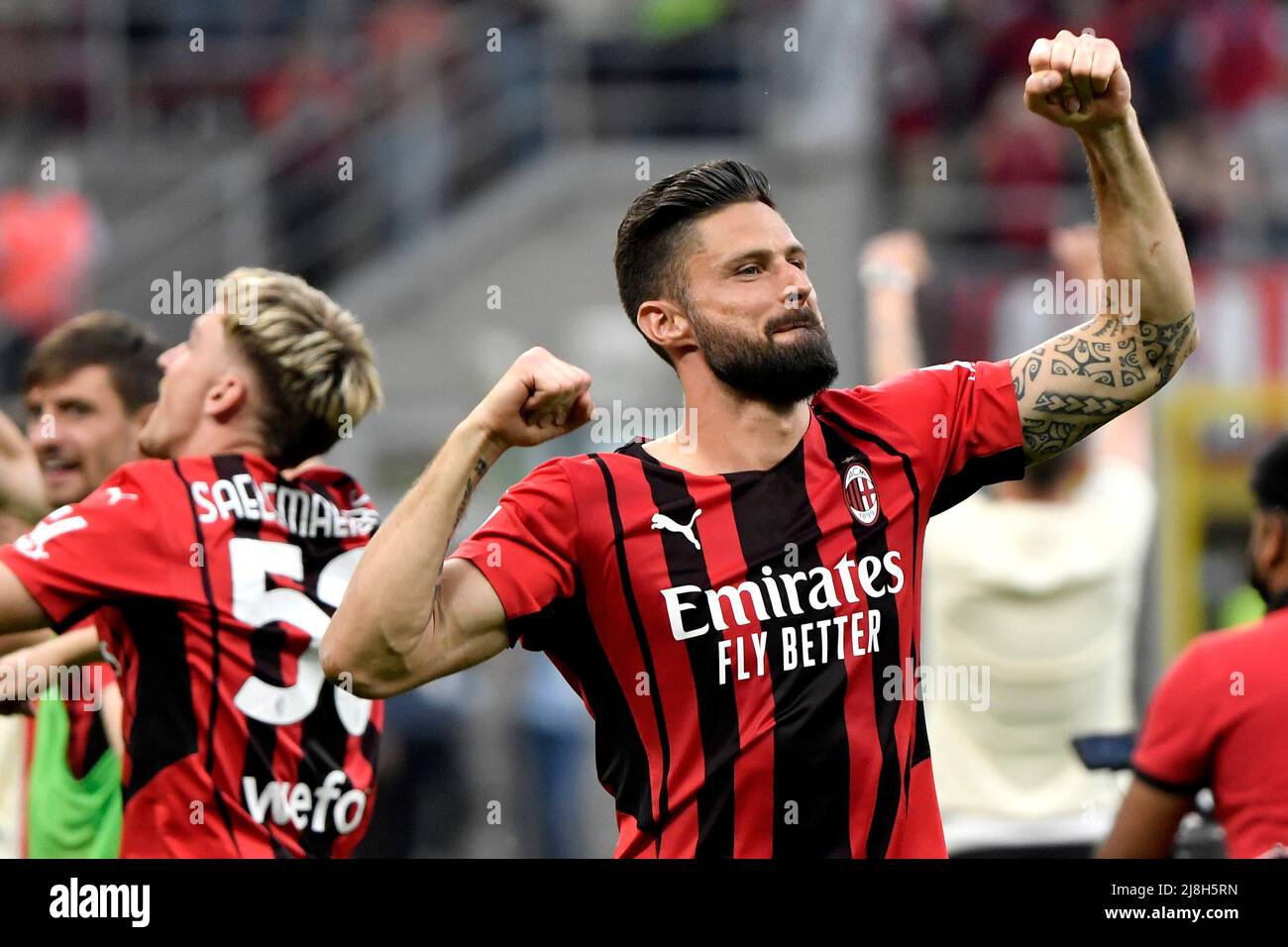 Olivier Giroud of AC Milan celebrates the victory at the end of the Serie A 2021/2022 football match between AC Milan and Atalanta BC at San Siro stad Stock Photo
