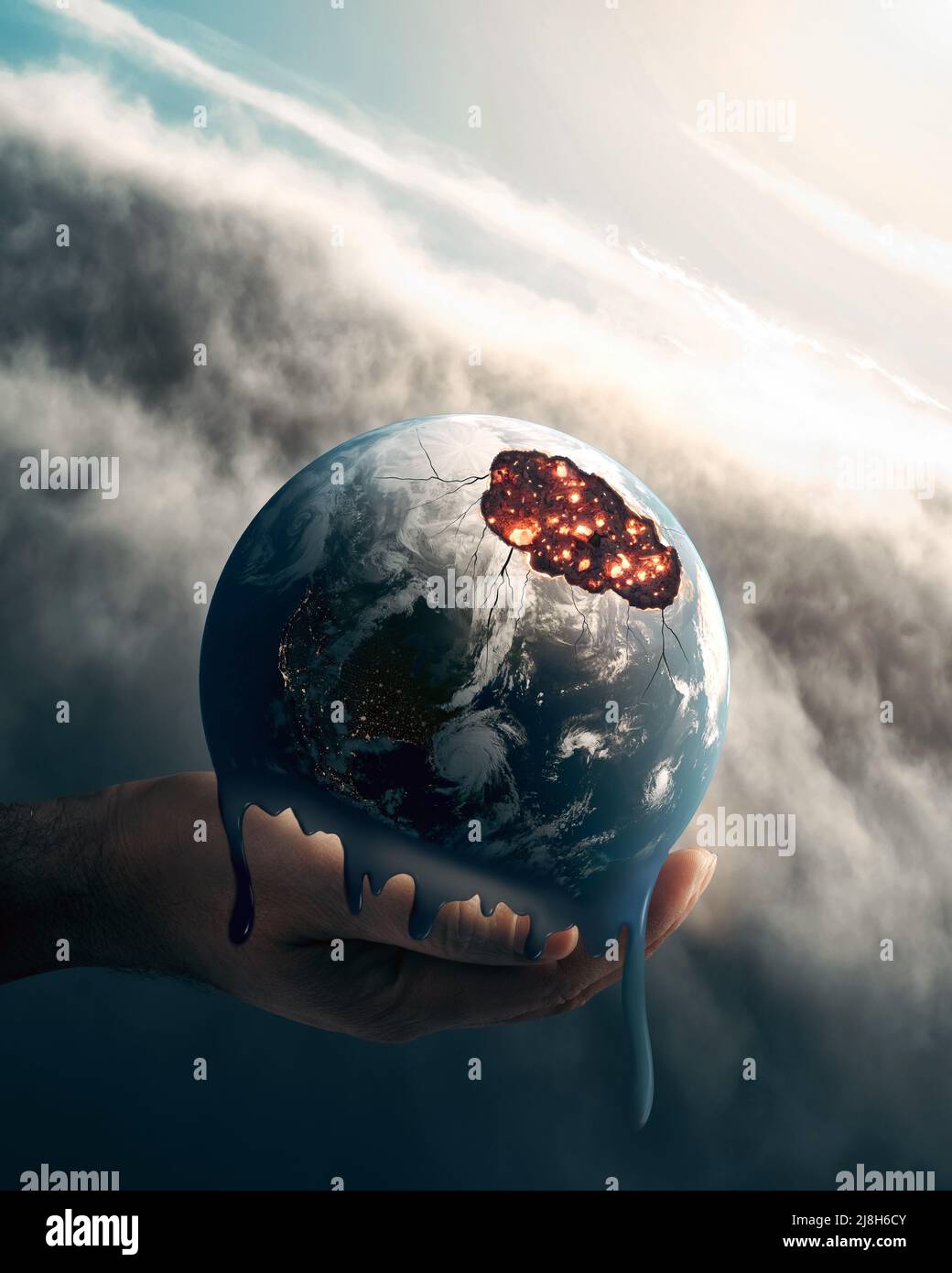 Hand is holding planet earth and try to save from melting because of environmental pollution and global warming. High quality photo Stock Photo