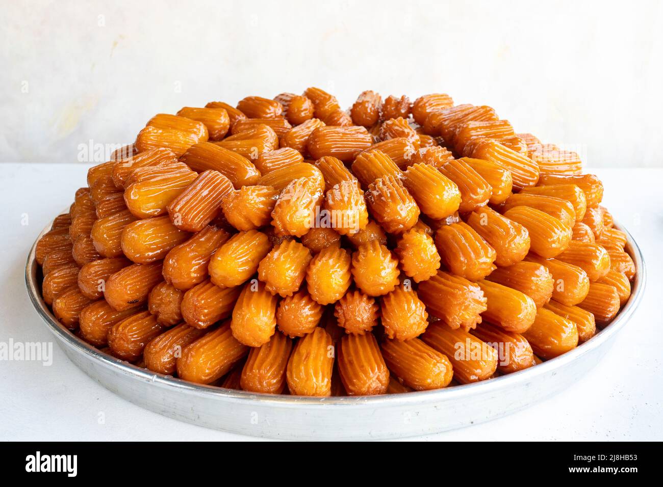 Tulumba dessert. Traditional Turkish cuisine delicacies Stock Photo