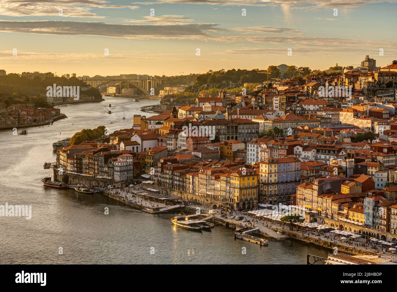 The old town of Porto with the river Douro during the last rays of the sun Stock Photo