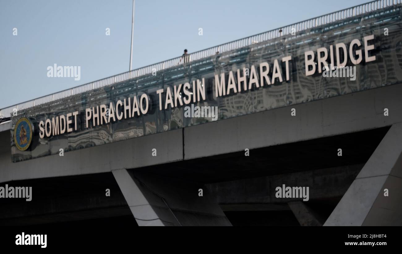 Somdet Phrachao Taksin Maharat Bridge aka The Taksin Bridge aka Sathorn Bridge over the Chao Phraya River Bangkok Thailand Stock Photo