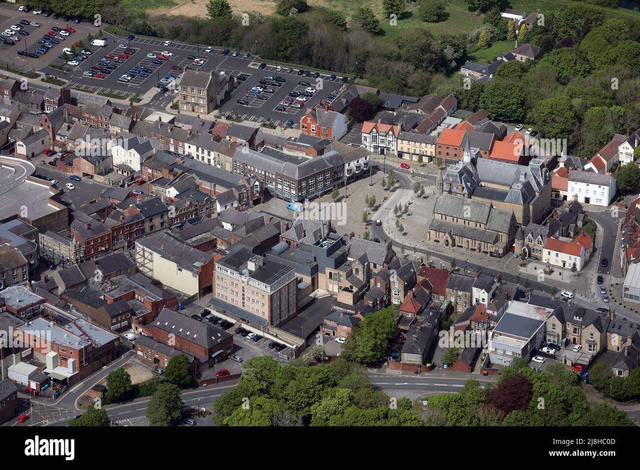 aerial view of Bishop Auckland town centre with the Town Hall prominent in the Market Place, County Durham, UK Stock Photo